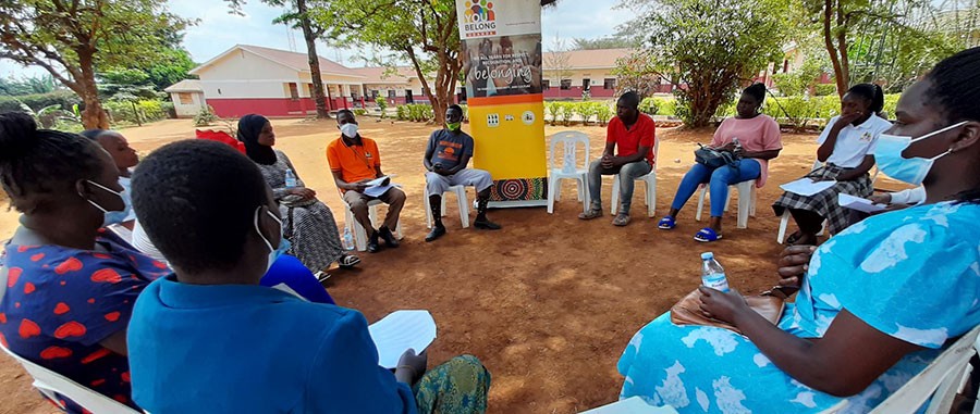 A YouBelong Uganda social worker facilitates a consultation meeting with young people