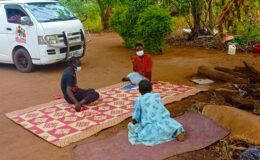 A YBU Community Mental Health Nurse speaks to the service user and family member during a return visit
