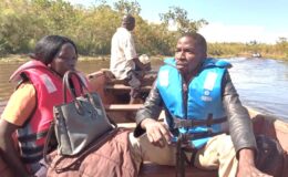 YBU team members board a Canoe boat enroute to the Island Health centres in Bussi and Zzinga (5)